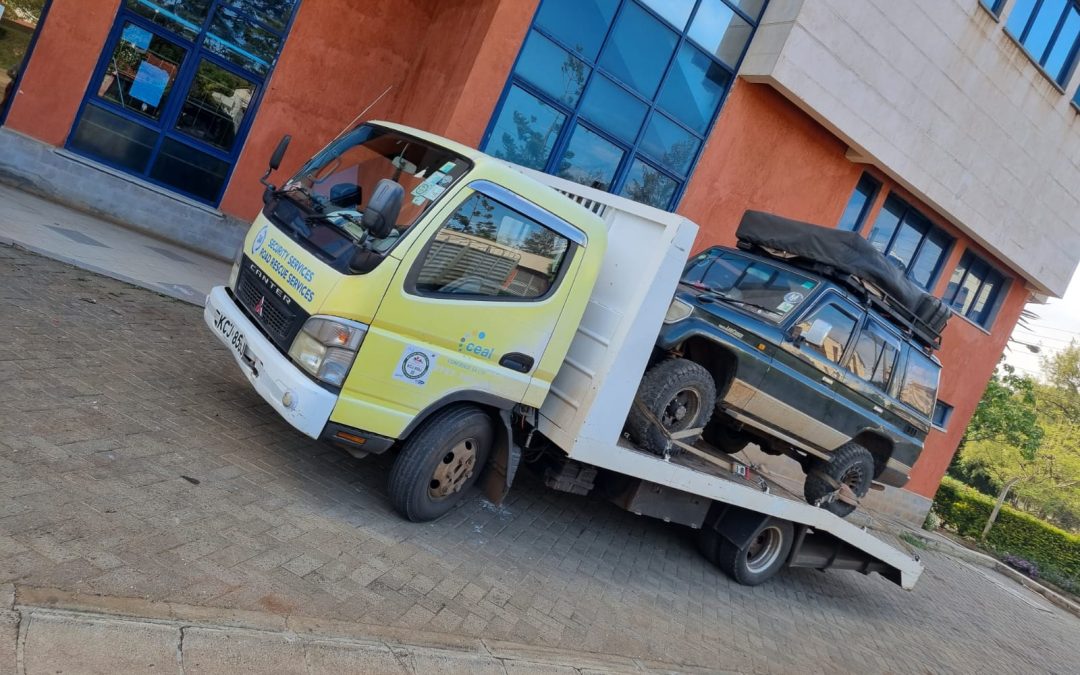 CEAL flatbed tow truck in operation